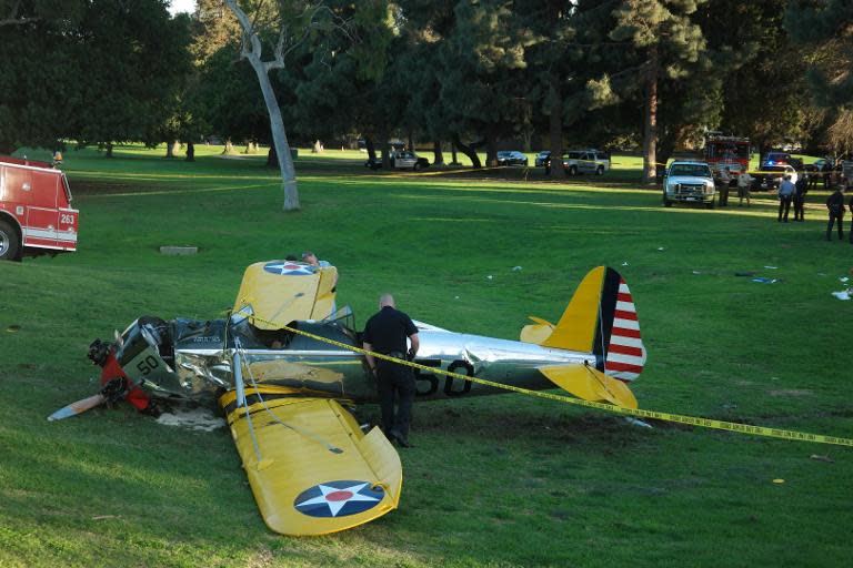 The small plane owned by US actor Harrison Ford pictured after crashing at the Penmar Golf Course in Venice, California on March 5, 2015