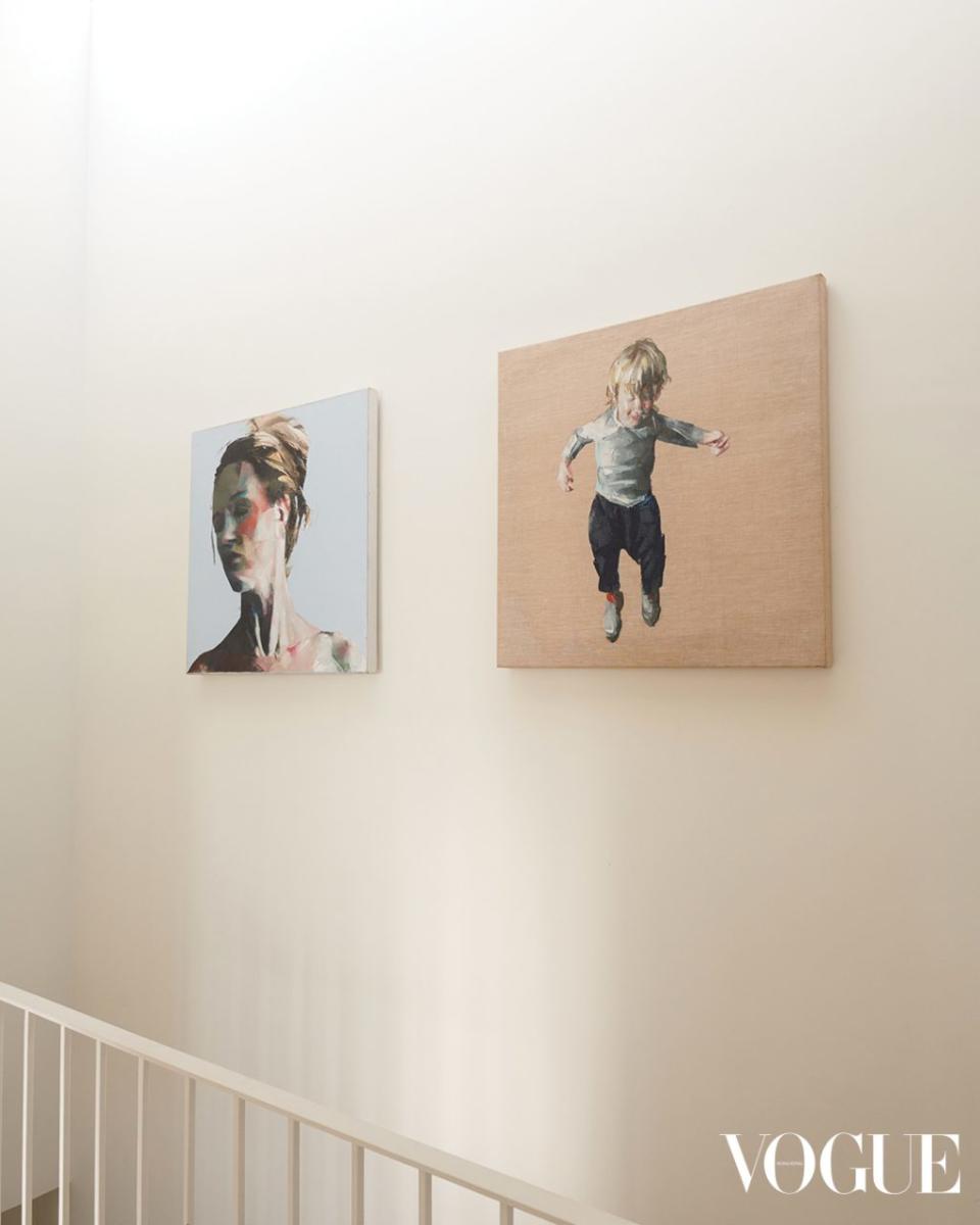 The walls are dotted with artwork, including pieces by celebrated artist Simon Birch. 