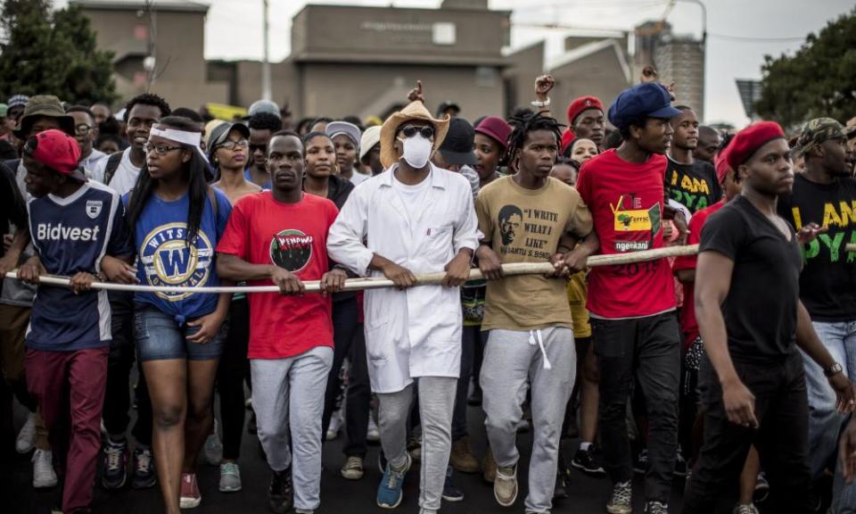 <span class="element-image__caption">South African students in Pretoria march against fee hikes in 2015 that they said will make it harder for poor black people to go to university</span> <span class="element-image__credit">Photograph: Marco Longari/AFP/Getty Images</span>