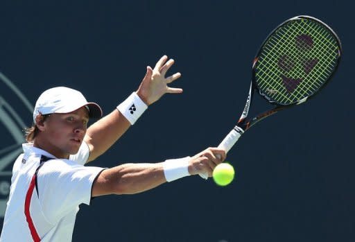 Ricardas Berankis of Lithuania hits a return to Nicolas Mahut of France during the Los Angeles Open. Bernakis won 6-4, 6-4