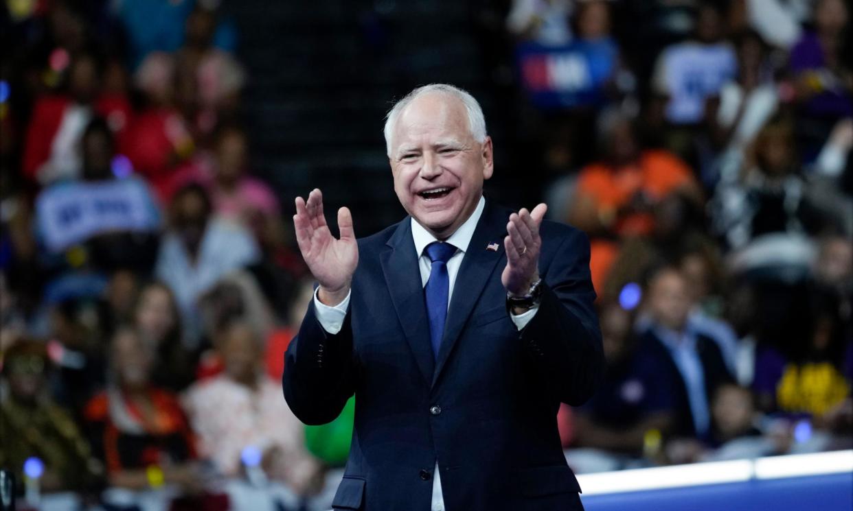 <span>Tim Walz is introduced as Kamala Harris’s running mate in Philadelphia on Tuesday.</span><span>Photograph: Matt Rourke/AP</span>