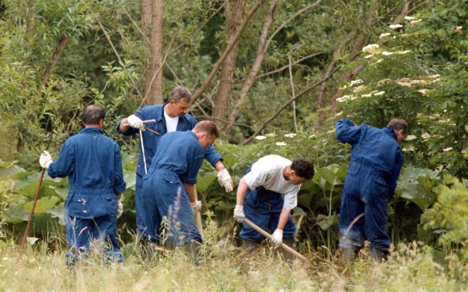 Investigators found numerous mass graves containing those trapped in Srebrenica - Reuters