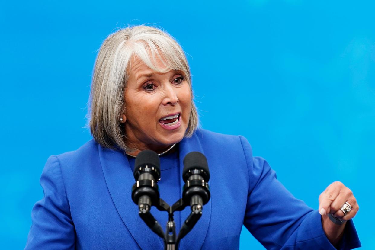 Democratic New Mexico Gov. Michelle Lujan Grisham talks prior to President Joe Biden speaking about the economy at Arcosa Wind Towers factory Wednesday, Aug. 9, 2023, in Belen, N.M.