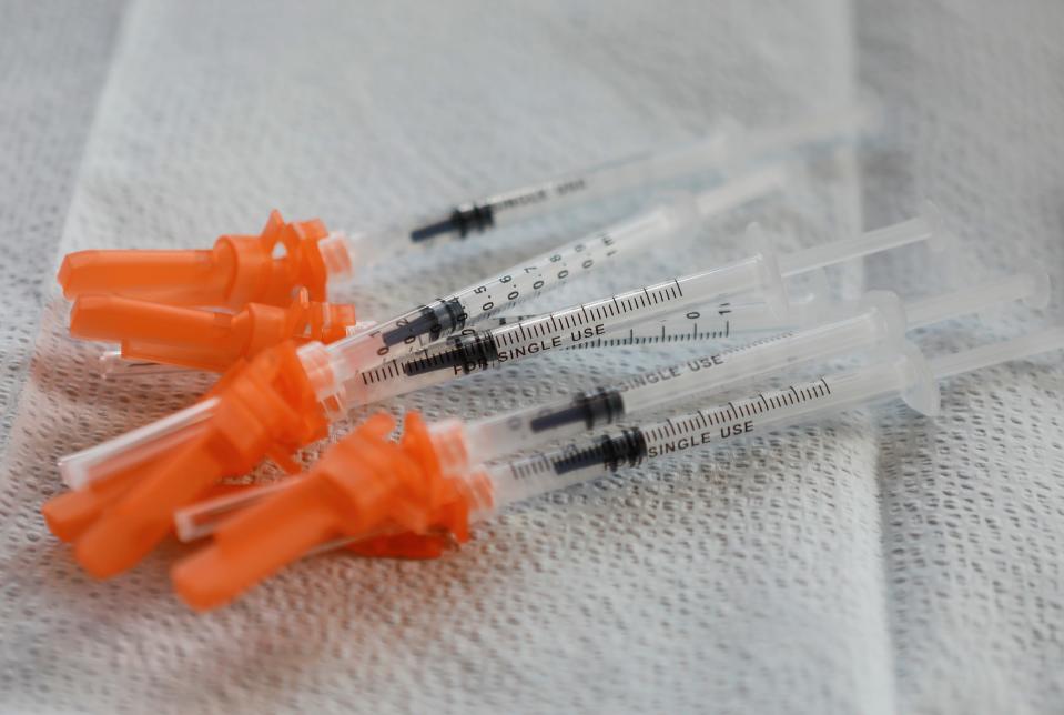 Syringes with COVID-19 vaccinations sit in waiting during the Columbus Public Health drop-in clinic at Stonewall Columbus in the Short North on Thursday, May 20, 2021. 