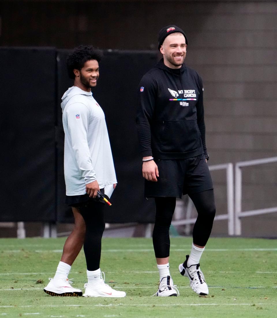Arizona Cardinals quarterback Kyler Murray and tight end Zach Ertz watch the practice during training camp at State Farm Stadium in Glendale on July 27, 2023.