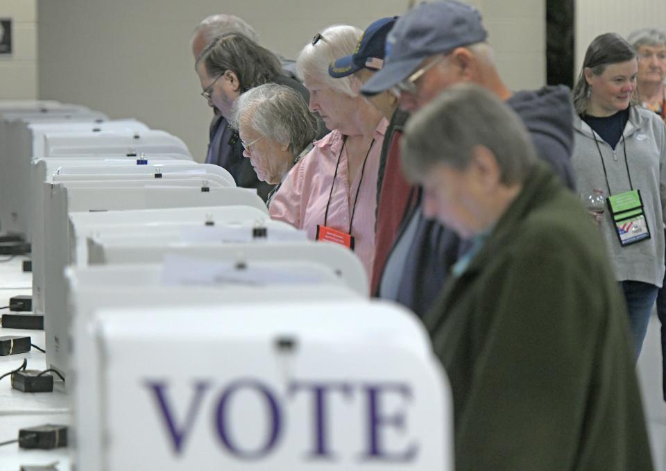 Voters cast their ballots Tuesday morning in the Youth Building at the Crawford County Fairgrounds.