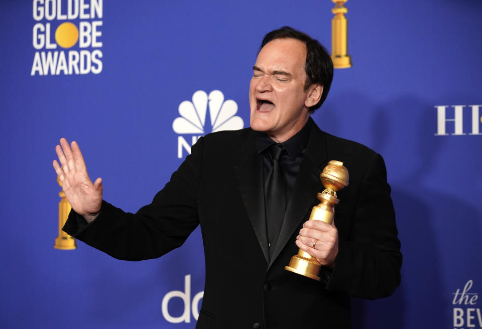77th Golden Globe Awards - Photo Room - Beverly Hills, California, U.S., January 5, 2020 - Quentin Tarantino poses backstage with one of two awards that he won on the evening. REUTERS/Mike Blake
