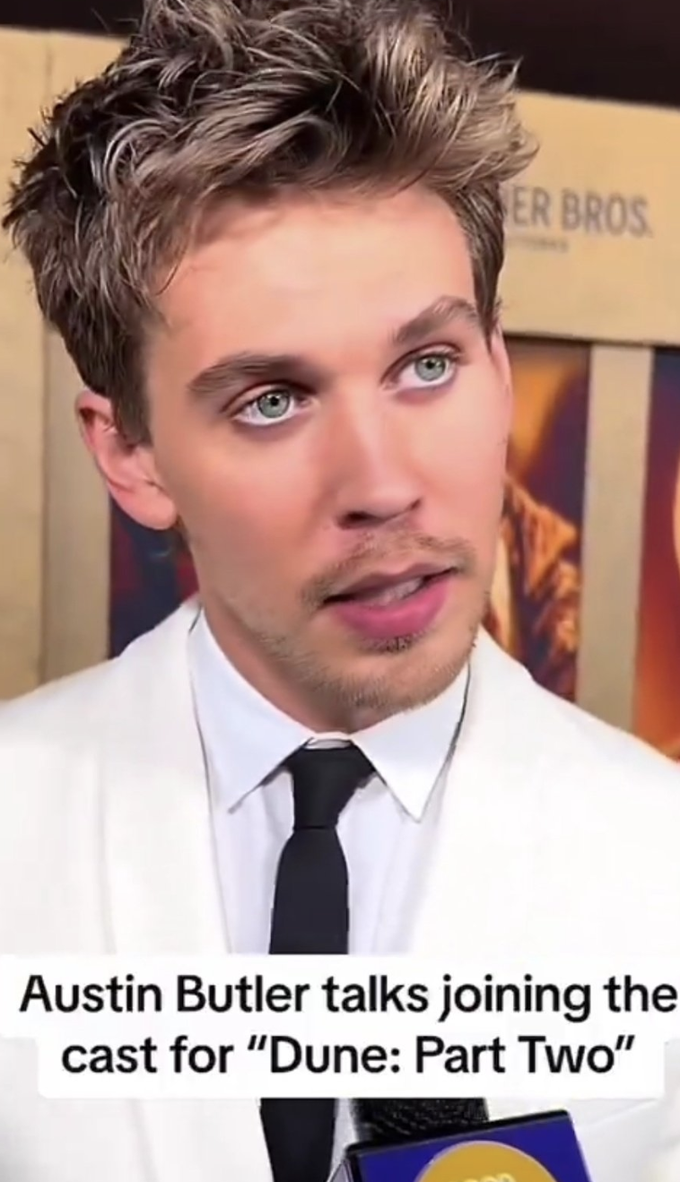 Close-up of Austin Butler in an interview, wearing a white shirt and tie and eyeliner, discussing "Dune: Part Two"