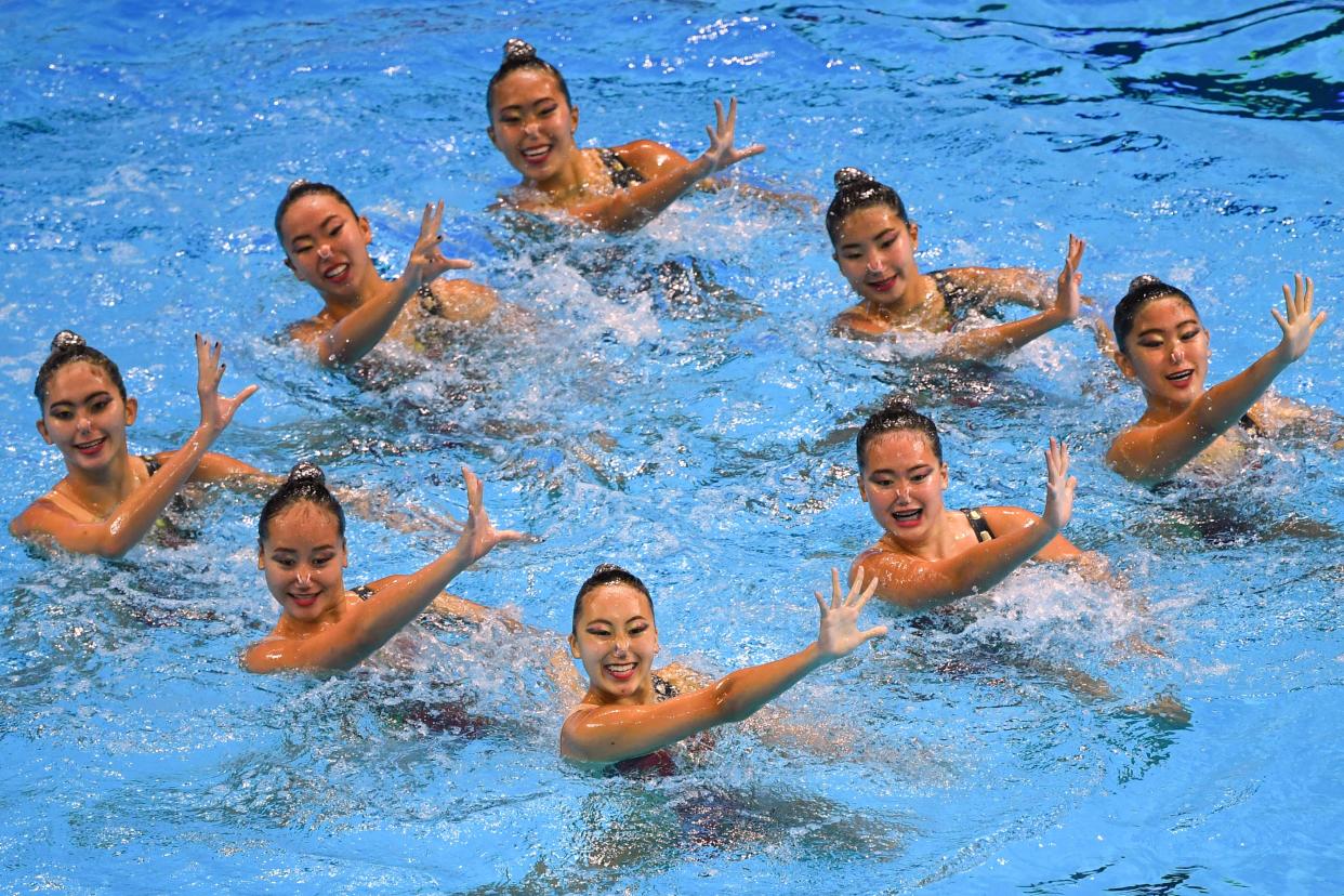 Singapore's team compete in the team free artistic swimming event during the 2019 World Championships at Yeomju Gymnasium in Gwangju on July 17, 2019. (Photo by Manan VATSYAYANA / AFP)        (Photo credit should read MANAN VATSYAYANA/AFP via Getty Images)