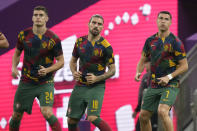 Portugal's Antonio Silva, left, Portugal's Ruben Neves, center, and Portugal's Cristiano Ronaldo warm up prior to the World Cup round of 16 soccer match between Portugal and Switzerland, at the Lusail Stadium in Lusail, Qatar, Tuesday, Dec. 6, 2022. (AP Photo/Darko Bandic)