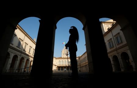 A silhouette of a member of Italian elite military unit Cuirassiers' Regiment is seen at the Quirinale Presidential Palace in Rome