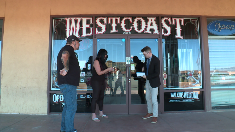<em>On May 14, owners and employees of West Coast Tattoo Parlor brought all the supplies and heavy equipment back into the business on the assurance of the new property manager that power would be restored, but the unit still wasn’t fixed. (KLAS)</em>