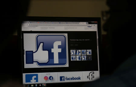 An illustration photo shows the Facebook page displayed on a computer screen at a cyber-cafe in downtown Nairobi, Kenya April 18, 2019. REUTERS/Stringer