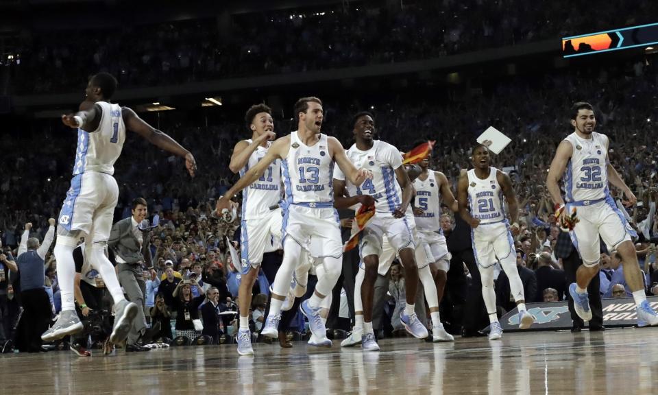 <p>North Carolina players celebrate after the finals of the Final Four NCAA college basketball tournament against Gonzaga, Monday, April 3, 2017, in Glendale, Ariz. North Carolina won 71-65. (AP Photo/David J. Phillip) </p>