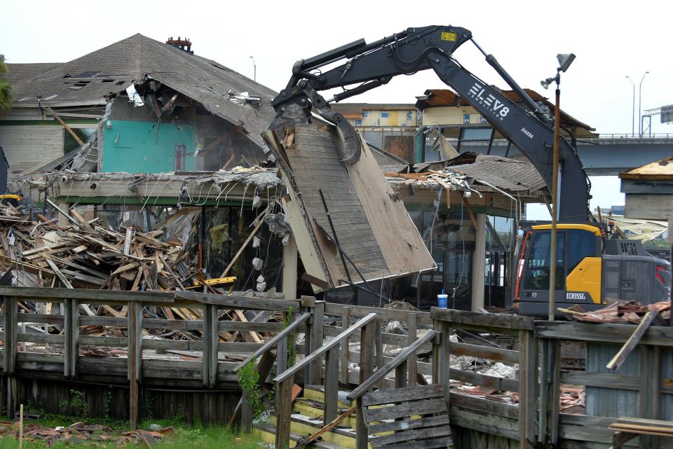 Demolition began Tuesday on the former River City Brewing Co. restaurant complex on the Southbank of the St Johns River in downtown Jacksonville. The iconic restaurant is being torn down to make way for a new apartment complex and restaurant.