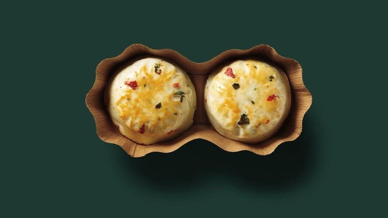 Two egg bites in a carton