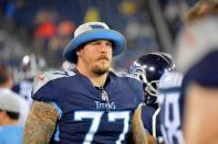 FILE PHOTO: Aug 30, 2018; Nashville, TN, USA; Tennessee Titans offensive tackle Taylor Lewan (77) on the sideline during the second half against the Minnesota Vikings at Nissan Stadium. Mandatory Credit: Jim Brown-USA TODAY Sports/File Photo