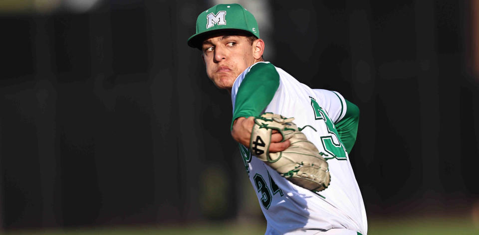 Mason pitcher Jacob Hanley (34) throws during their baseball game against Moeller at Prasco Park in Mason Saturday, April 20, 2024.