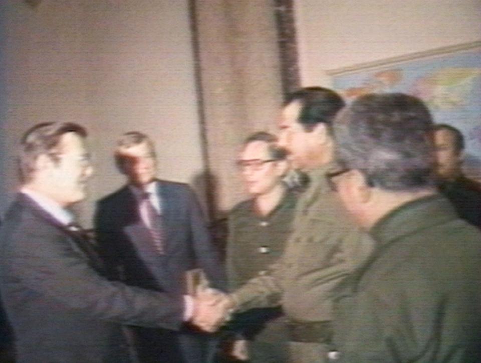 Rumsfeld met with Saddam Hussein in Iraq in 1983 (Getty Images)