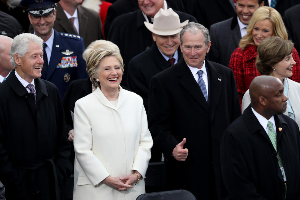 <p>Former President Bill Clinton (L), former Democratic presidential nominee Hillary Clinton and former President George W. Bush stand on the West Front of the U.S. Capitol on January 20, 2017 in Washington, DC. (Photo: Joe Raedle/Getty Images) </p>