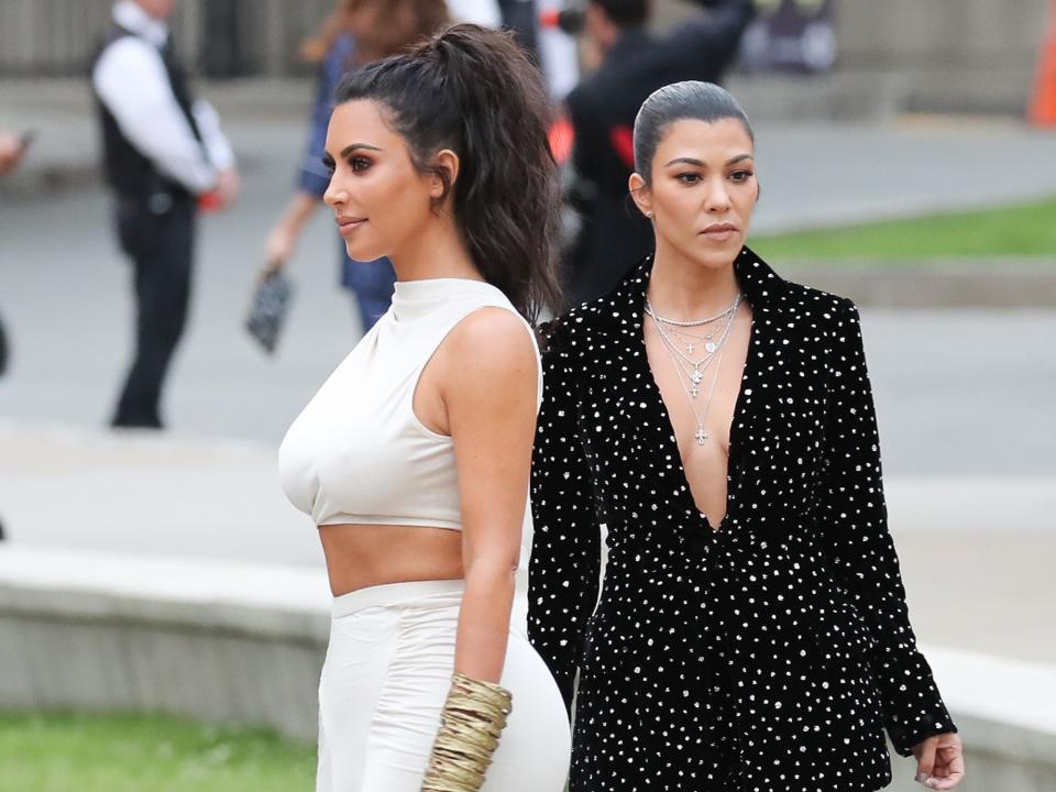 Kim Kardashian and Kourtney Kardashian on June 4, 2018 in New York City.