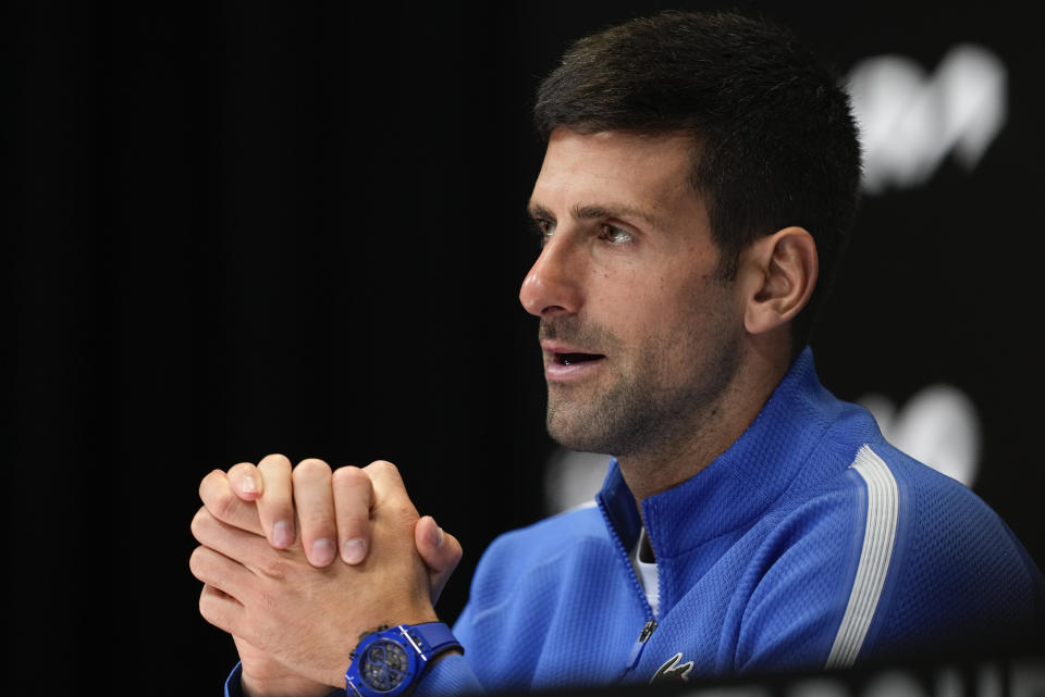 Novak Djokovic of Serbia reacts during a press conference following his loss to Jannik Sinner of Italy in their semifinal at the Australian Open tennis championships at Melbourne Park, Melbourne, Australia, Friday, Jan. 26, 2024. (AP Photo/Louise Delmotte)