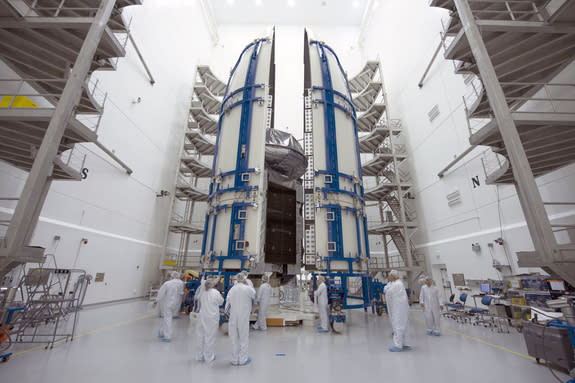 The U.S. Navy's fourth Mobile User Objective System (MUOS-4) satellite is encapsulated inside a 5-meter (16 feet) payload fairing in preparation for launch on an Atlas V rocket.