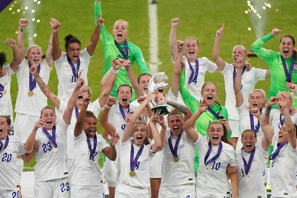 England’s Leah Williamson and Millie Bright lift the Euro 2022 trophy. (PA Wire)