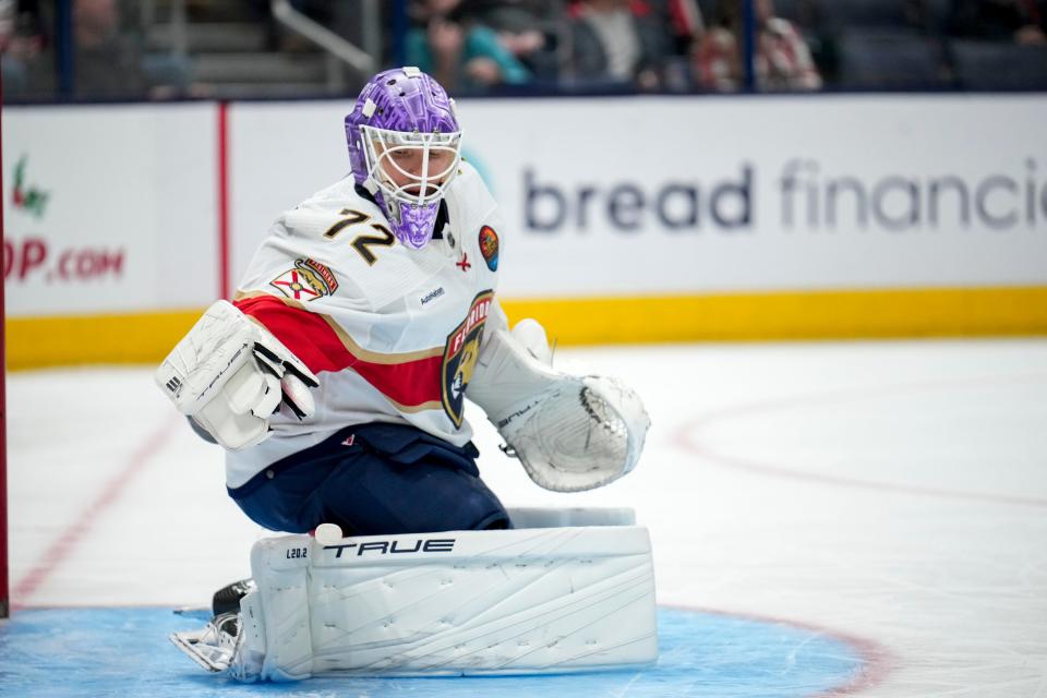 Nov 20, 2022; Columbus, Ohio, United States;  Florida Panthers goaltender Sergei Bobrovsky (72) uses his hockey stick as a chair during the first period of the NHL hockey game at Nationwide Arena. Mandatory Credit: Joseph Scheller-The Columbus Dispatch