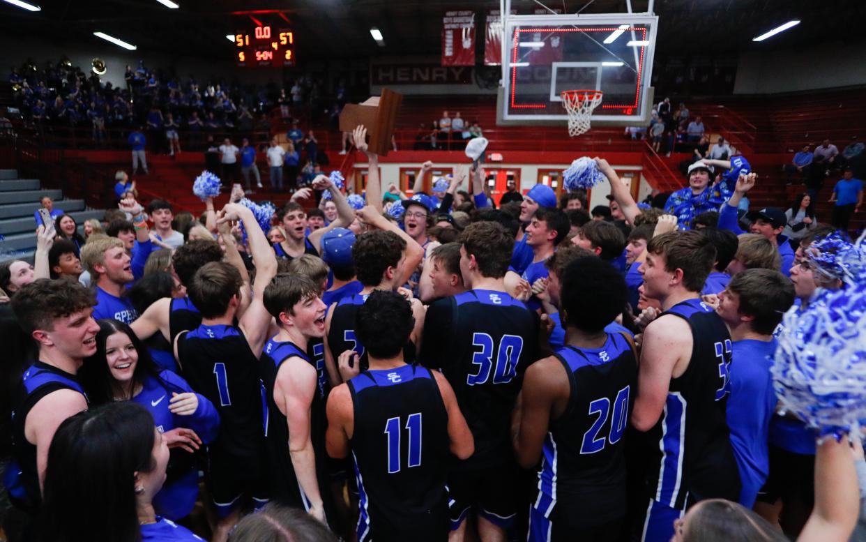 Spencer County celebrates beating Simon Kenton in the KHSAA 8th Region Championship Tuesday night.
Mar. 12, 2-24