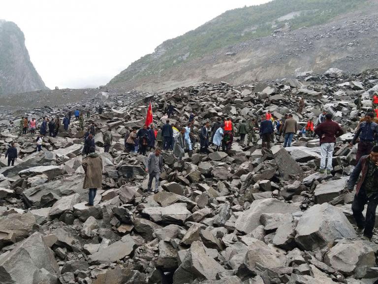China landslide: More than 140 feared dead as Sichuan homes swept away