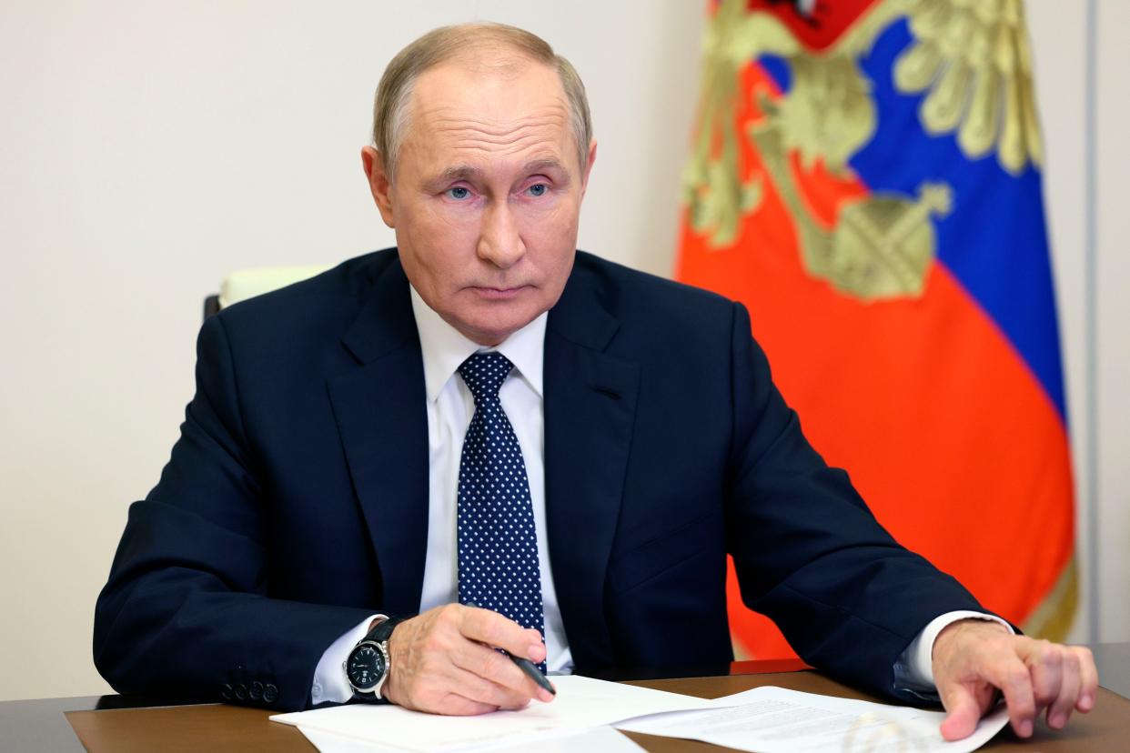 Russian President Vladimir Putin attends a meeting via videoconference at the Novo-Ogaryovo residence outside Moscow, Russia, Wednesday, Oct. 5, 2022.