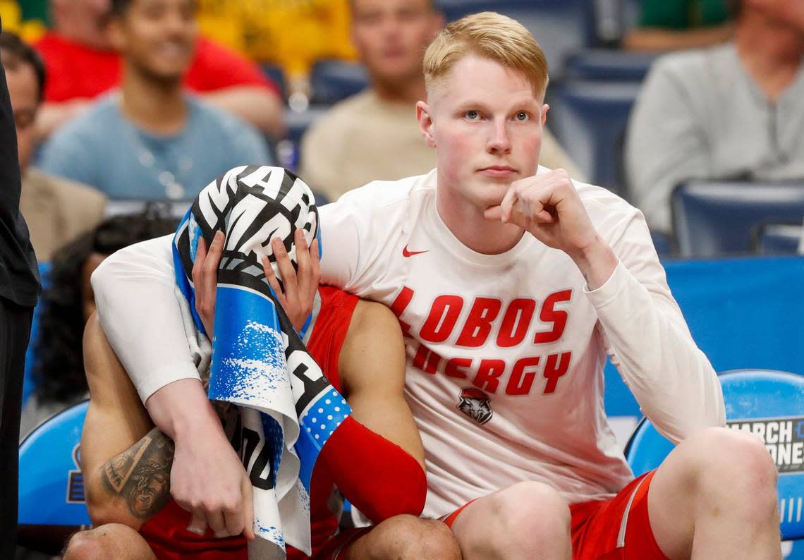 New Mexico’s Jaelen House (10) puts his head in his hands as he is consoled by Sebastian Forsling (21) on the bench during the first round game between Clemson University and University of New Mexico in the 2024 NCAA Tournament at FedExForum in Memphis, Tenn., on Friday, March 22, 2024. Chris Day/The Commercial Appeal/The Commercial Appeal / USA TODAY NETWORK