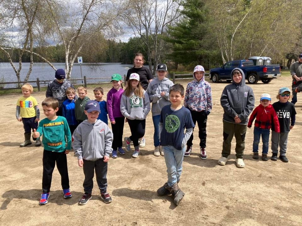 Children pose for group pictures at the conclusion of the Elks Fishing Derby.