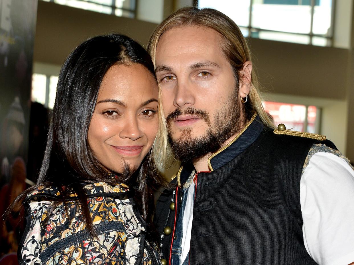 Zoe Saldana (L) and artist Marco Perego attend the "Infinitely Polar Bear" premiere during the 2015 Los Angeles Film Festival at Regal Cinemas L.A. Live on June 14, 2015 in Los Angeles, California