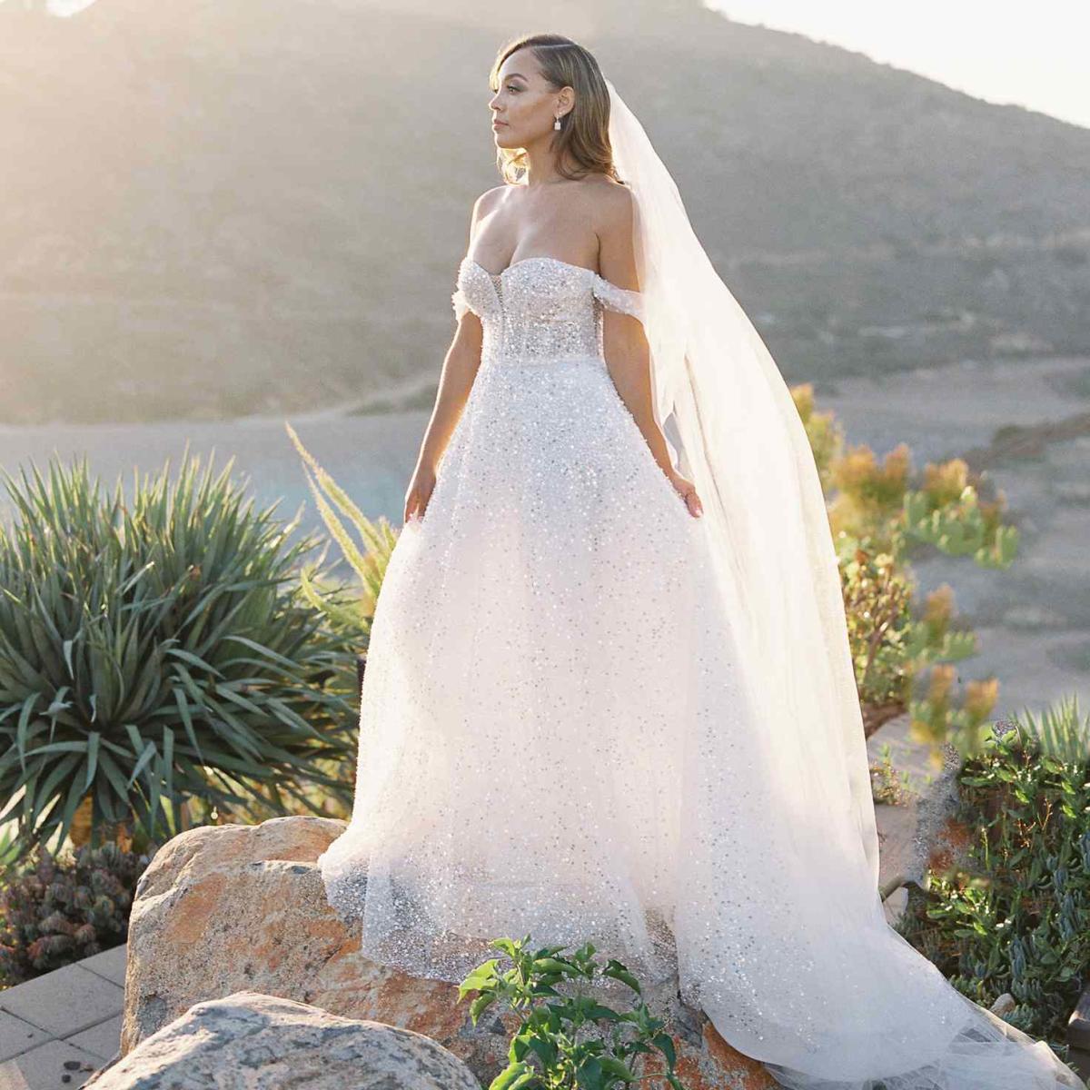 19 Bell Sleeve Wedding Dresses That Steal the Show