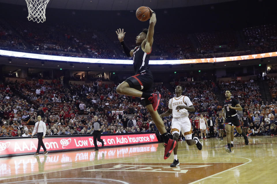 Texas Tech guard Terrence Shannon Jr. (1) drives to the basket for a score against Texas during the first half of an NCAA college basketball game, Saturday, Feb. 8, 2020, in Austin, Texas. (AP Photo/Eric Gay)