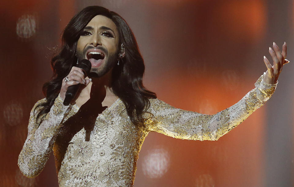 AP10ThingsToSee - Singer Conchita Wurst, representing Austria, performs the song "Rise Like a Phoenix" during a rehearsal for the second semifinal of the Eurovision Song Contest in the B&W Halls in Copenhagen, Denmark on Wednesday, May 7, 2014. Born Thomas Neuwirth, the performer challenges conceptions of masculine and feminine beauty. (AP Photo/Frank Augstein)