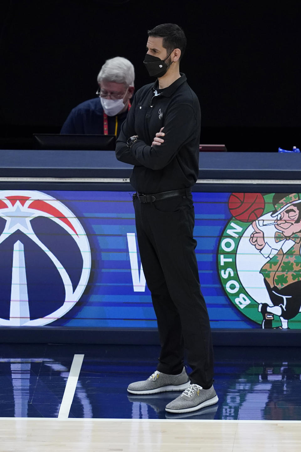 Charlotte Hornets coach James Borrego watches during the second half of the team's NBA basketball Eastern Conference play-in game against the Indiana Pacers, Tuesday, May 18, 2021, in Indianapolis. Indiana won 144-117. (AP Photo/Darron Cummings)