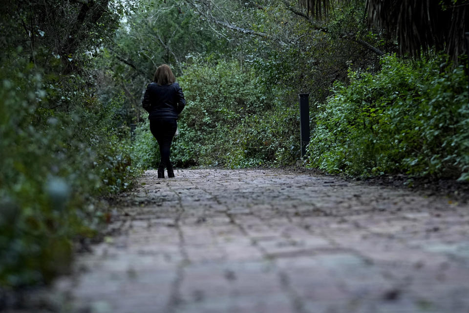 Irma Reyes visits a park near her South Texas home where she and her daughter would frequently talk and reflect, Wednesday, Feb. 1, 2023. Reyes feels like "collateral damage" in the plea deal that let the two men charged with sex trafficking her teenage daughter walk free. (AP Photo/Eric Gay)