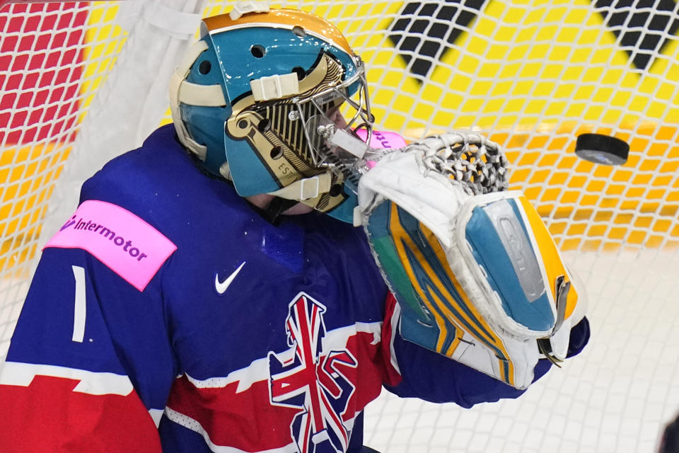 Britain's goalkeeper Jackson Whistle fails to make a save during the preliminary round match between Great Britain and Canada at the Ice Hockey World Championships in Prague, Czech Republic, Saturday, May 11, 2024. (AP Photo/Petr David Josek)