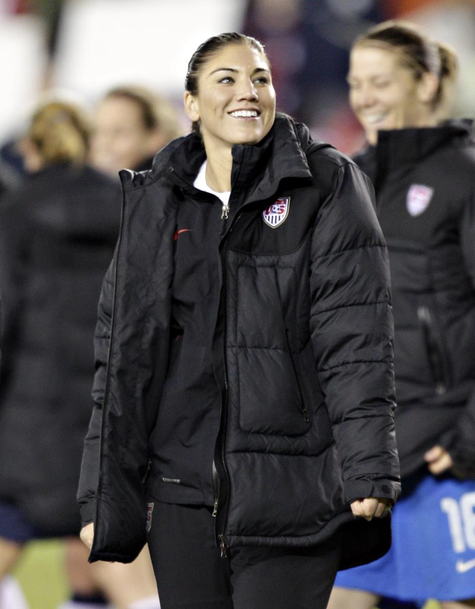 HOUSTON, TX - DECEMBER 12: Hope Solo (1) leads her team off the field after defeating China at BBVA Compass Stadium on December 12, 2012 in Houston, Texas. USA won 4-0. (Photo by Bob Levey/Getty Images)