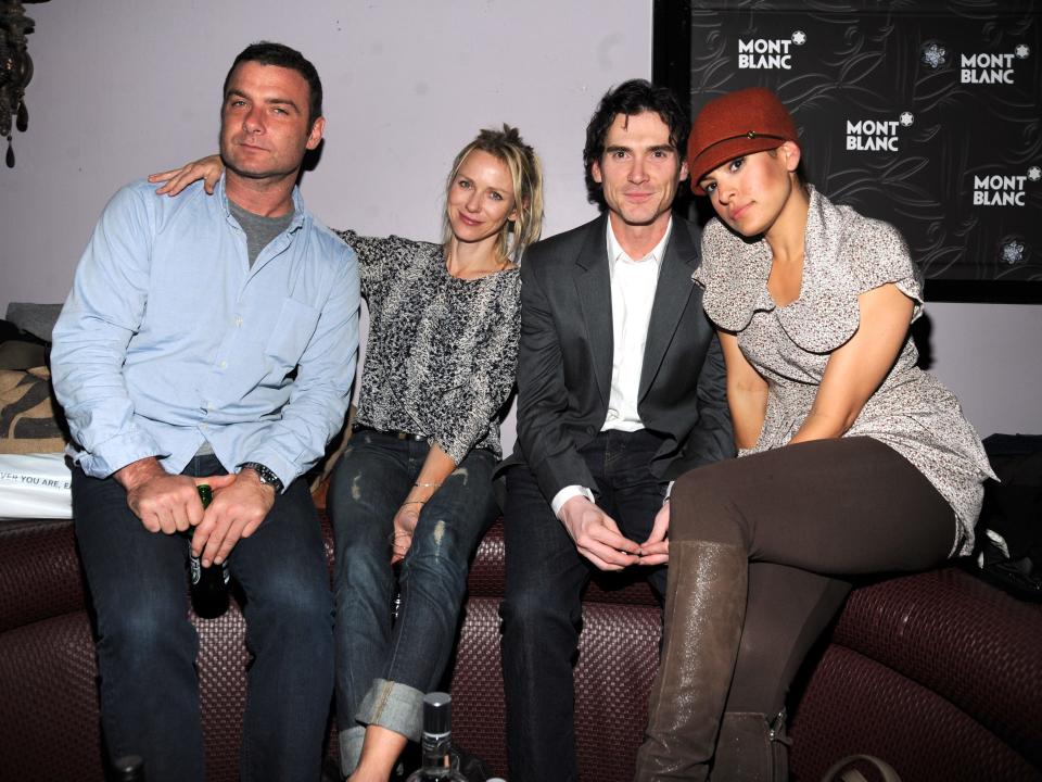 Liev Schreiber, Naomi Watts, Billy Crudup, and Eva Mendes photographed on a couch.