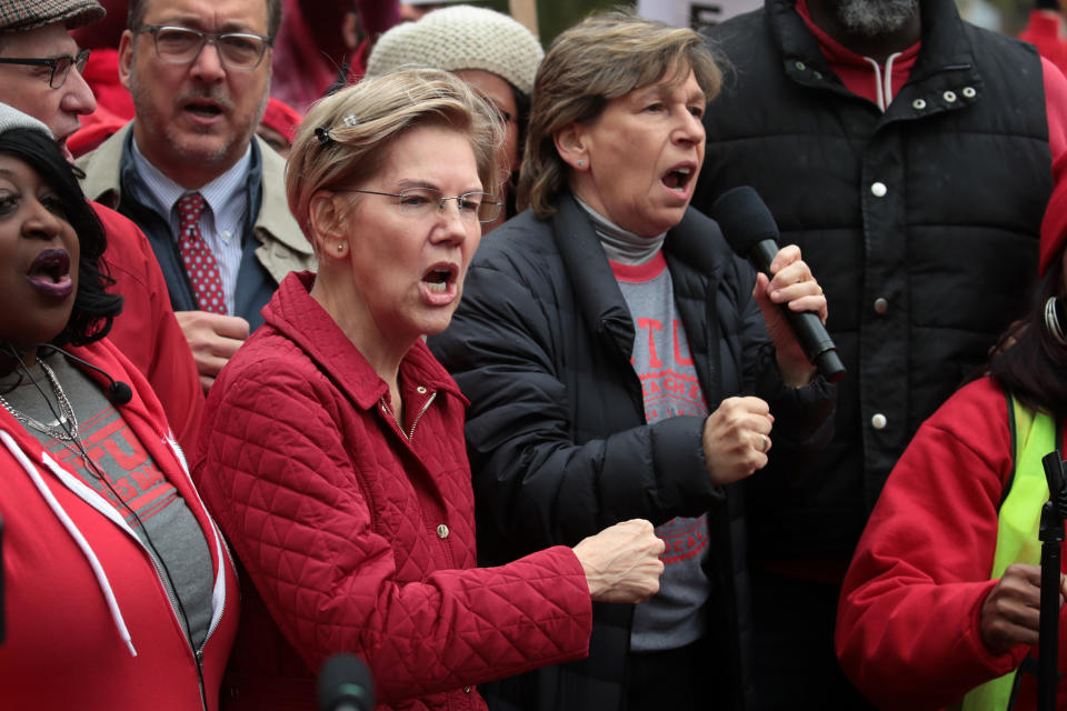 CHICAGO, ILLINOIS - OCTOBER 22: Democratic presidential candidate Sen. Elizabeth Warren (D-MA) (L) and American Federation of Teachers   (AFT) president Randi Weingarten visit with striking Chicago teachers at Oscar DePriest Elementary School on October 22, 2019 in Chicago, Illinois. About 25,000 Chicago school teachers went on strike last week after the Chicago Teachers Union (CTU) failed to reach a contract agreement with the city. With about 300,000 students, Chicago has the third largest public school system in the nation.  (Photo by Scott Olson/Getty Images)