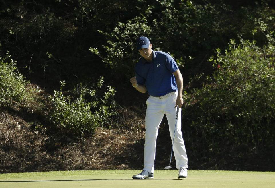 Jordan Spieth reacts to his par saving putt on the 12th hole during the third round of the Masters golf tournament Saturday, April 8, 2017, in Augusta, Ga. (AP Photo/Charlie Riedel)