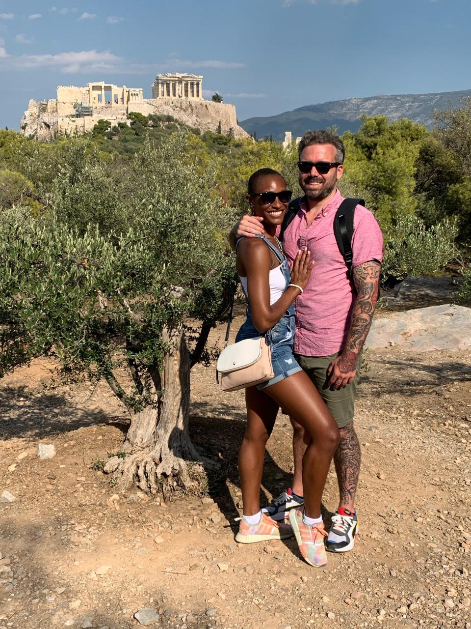 Krystina Burton and Gabriel Solberg by the Acropolis of Athens, in Greece.