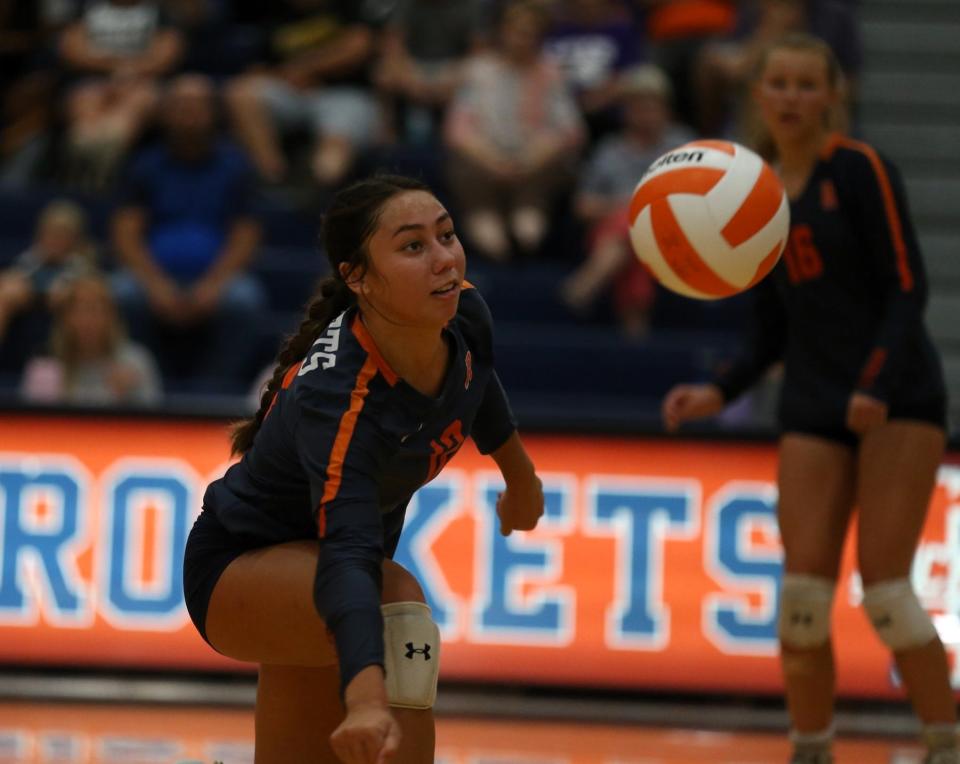 Rochester's Charlotte Beatty attempts to save the ball during a nonconference volleyball match against Tayloville at the Rochester Athletic Complex on Monday, August 21, 2023. Rochester won 19-25, 25-21, 25-13.