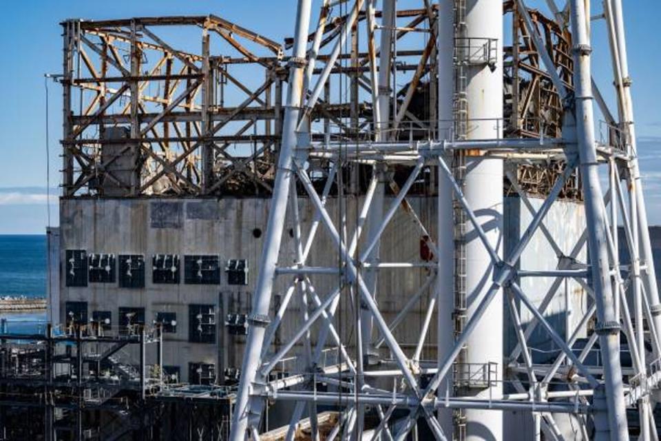 This picture taken on 20 January 2023 shows the reactor unit no. 1 building of the Tokyo Electric Power Company’s (Tepco) Fukushima Daiichi nuclear power plant, in Okuma of Fukushima prefecture (AFP via Getty Images)