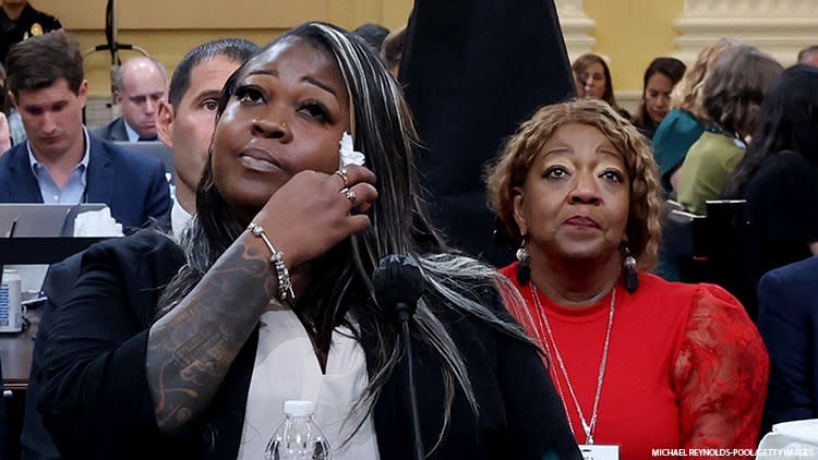 Shaye Moss with her mother Ruby Freeman behind her