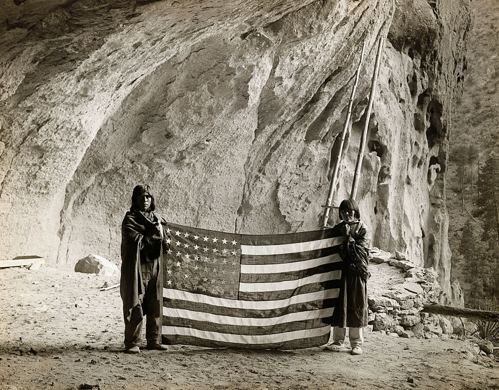 Native Americans Displaying American Flag